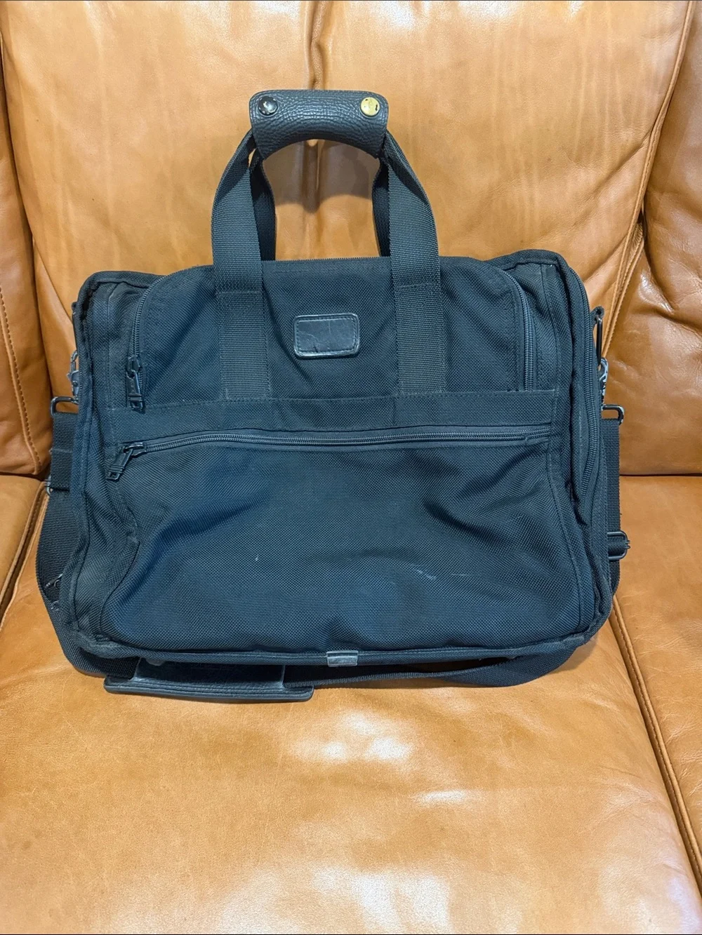 Tumi Black Laptop Briefcase with Top Handles and Shoulder Strap